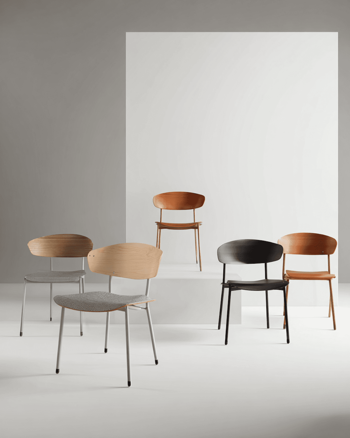 Set of modern dining chairs with wooden seats and slim metal legs